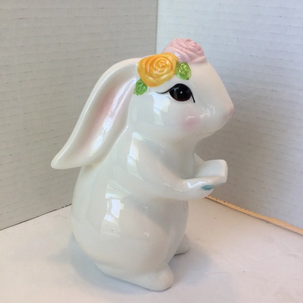 Ceramic Bunny Figurine holding book with Floral Accents